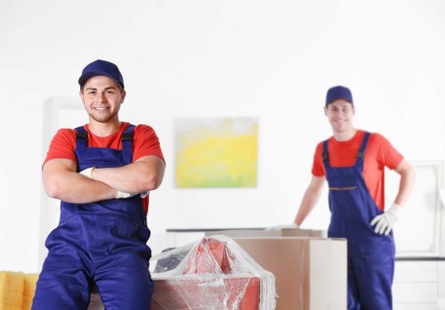 Local man and van loading furniture for a Surrey home move