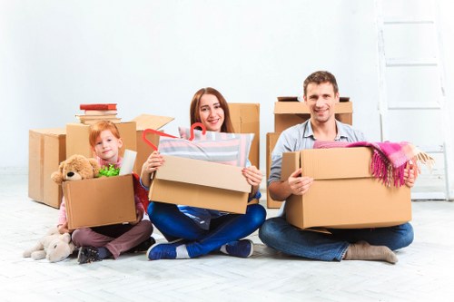 Student removals van loading boxes outside a Surrey property