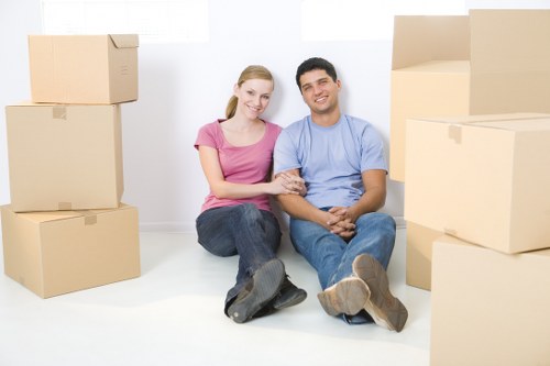 Same day removals team loading household furniture in Surrey