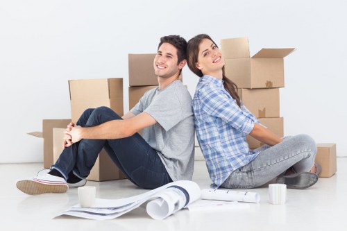 Selection of sturdy cardboard boxes and tape for local packing services