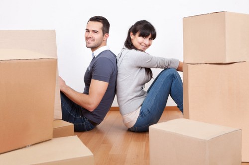 Packed boxes and protected furniture ready for a home move in Surrey